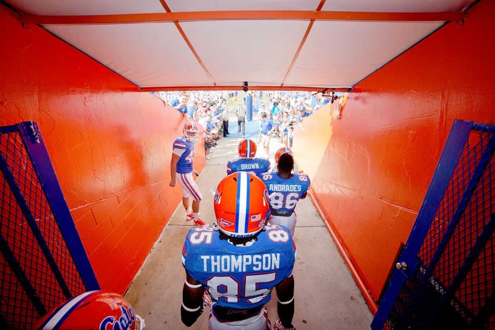 UF football players walking through the tunnel to enter onto the playing field at game day