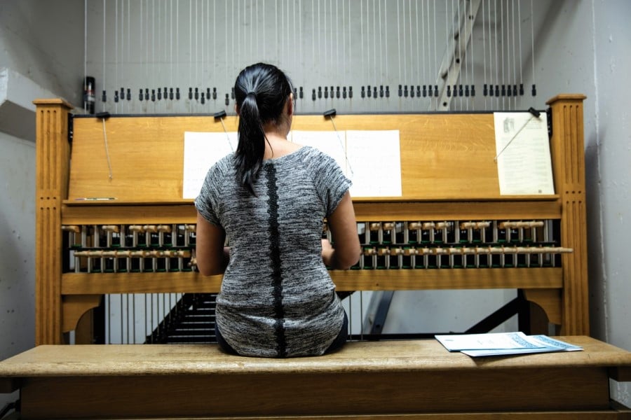 Woman playing the carillon